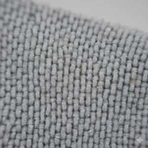 Highly zoomed-in shot detailing the ultra-fine weave and density of the microfiber camera lens cleaning cloth material.
